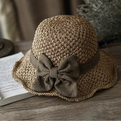 elegant-woven-straw-sun-hat-with-bow-9826
