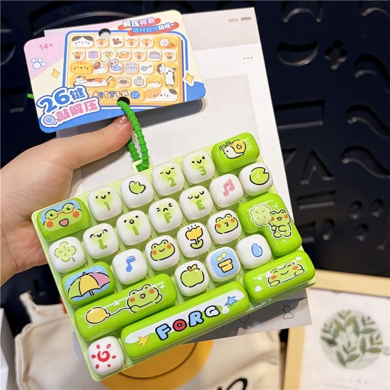 🎖️26-Key Decompression Button Toy Squeeze Keyboard Keychain