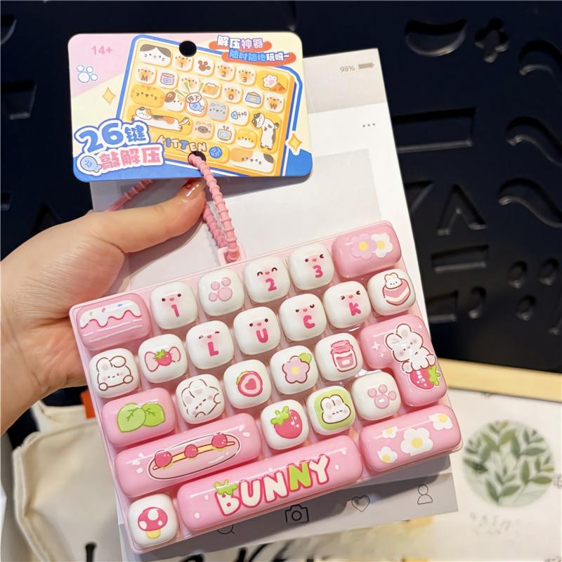 🎖️26-Key Decompression Button Toy Squeeze Keyboard Keychain