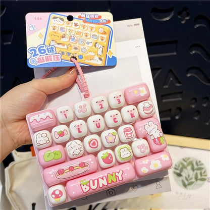 🎖️26-Key Decompression Button Toy Squeeze Keyboard Keychain