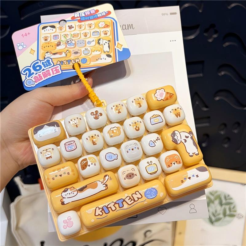 🎖️26-Key Decompression Button Toy Squeeze Keyboard Keychain